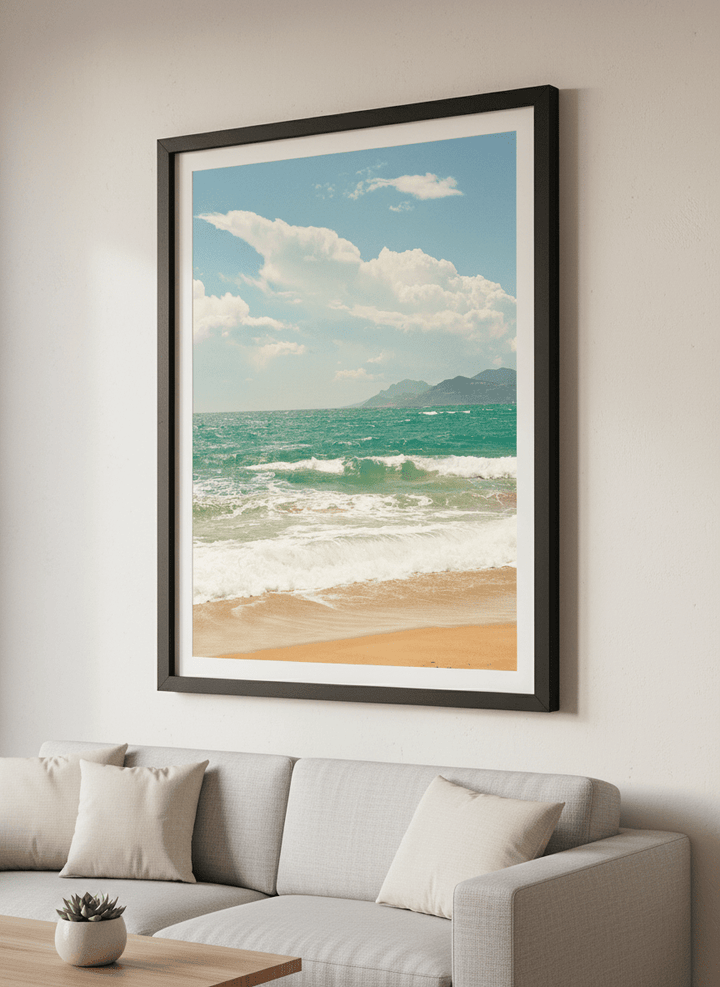 Modern wall art styled above a sofa in a neutral living room
