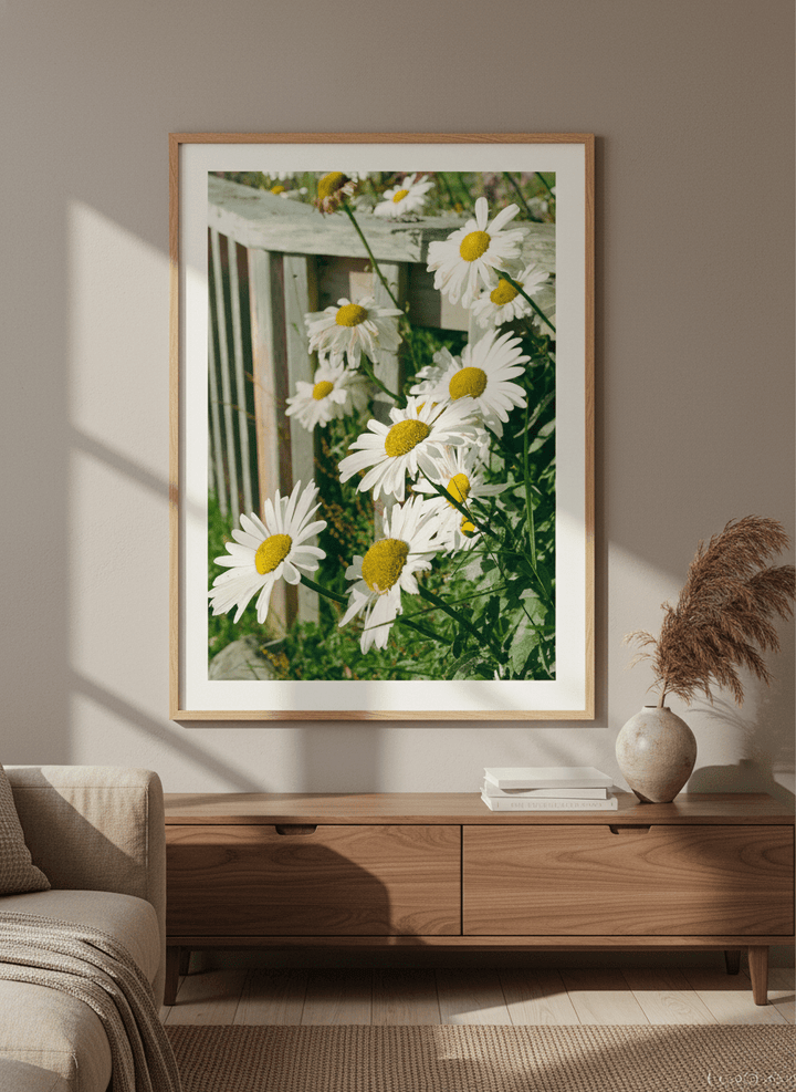 Modern wall art styled above a sofa in a neutral living room