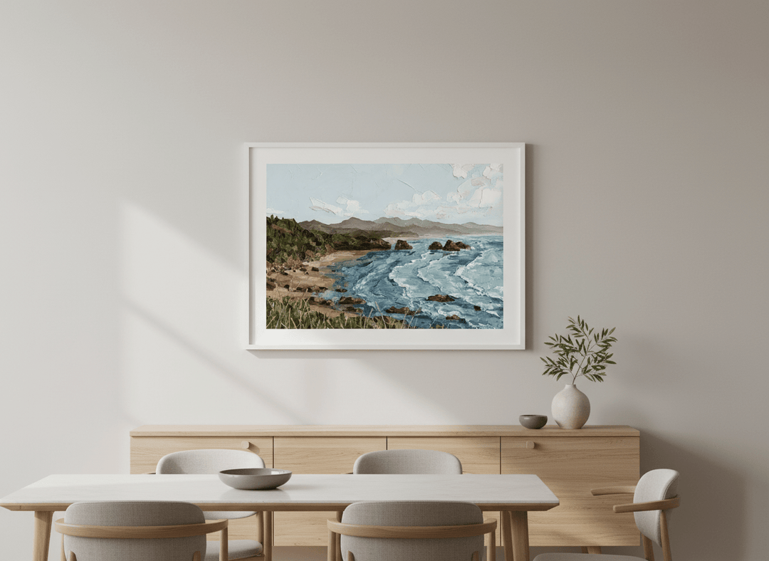 Wall art styled above a dining table in a contemporary home