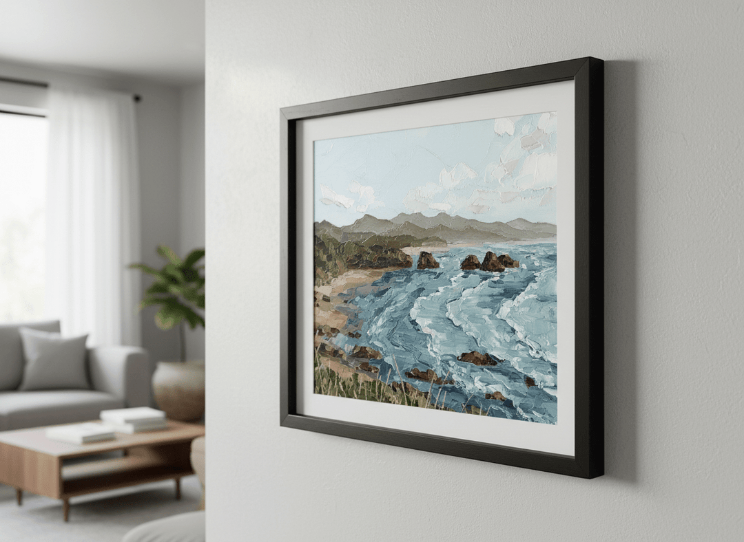 Modern wall art styled above a sofa in a neutral living room