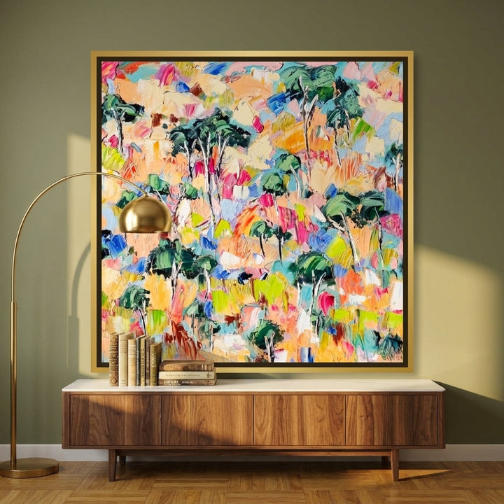 Canvas wall art with a gold leaf surround styled on the wall in a mid-century kitchen