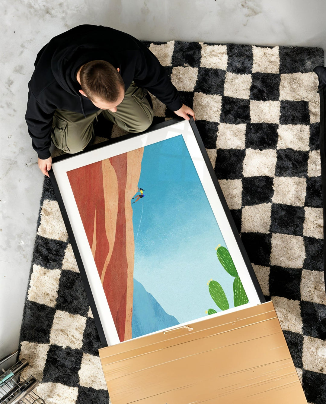 a person unboxing a poster