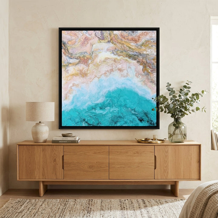 Canvas wall art with a black surround styled in a calm, light-filled bedroom