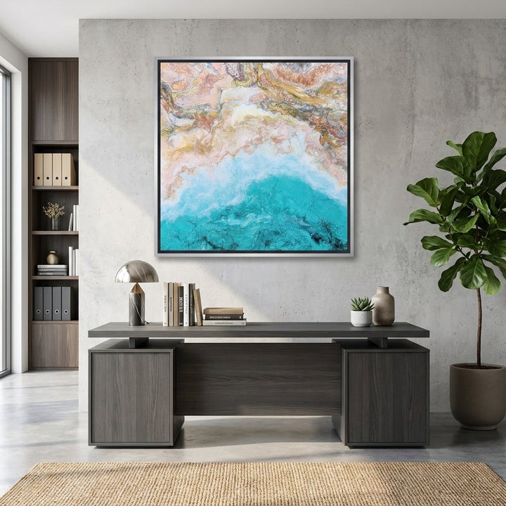 Canvas wall art with a silver leaf surround styled in a bright modern office