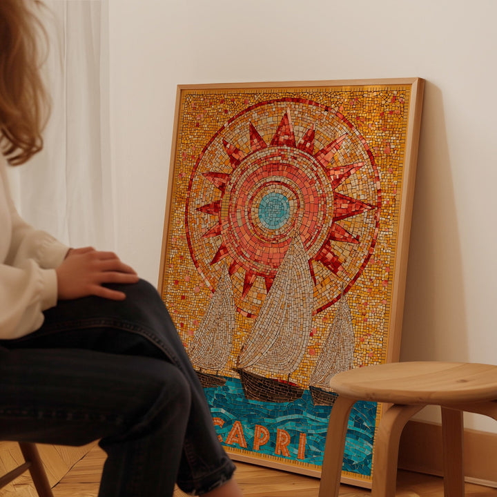 Person sitting next to a mosaic artwork with 'April' text on a wall.