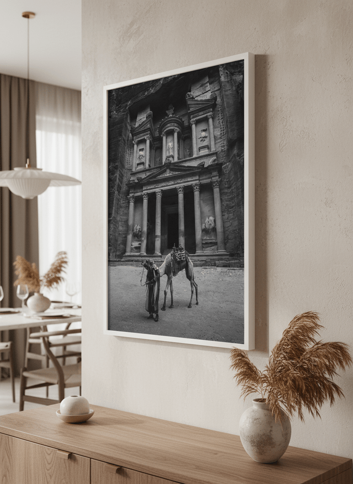 Wall art styled above a dining table in a contemporary home