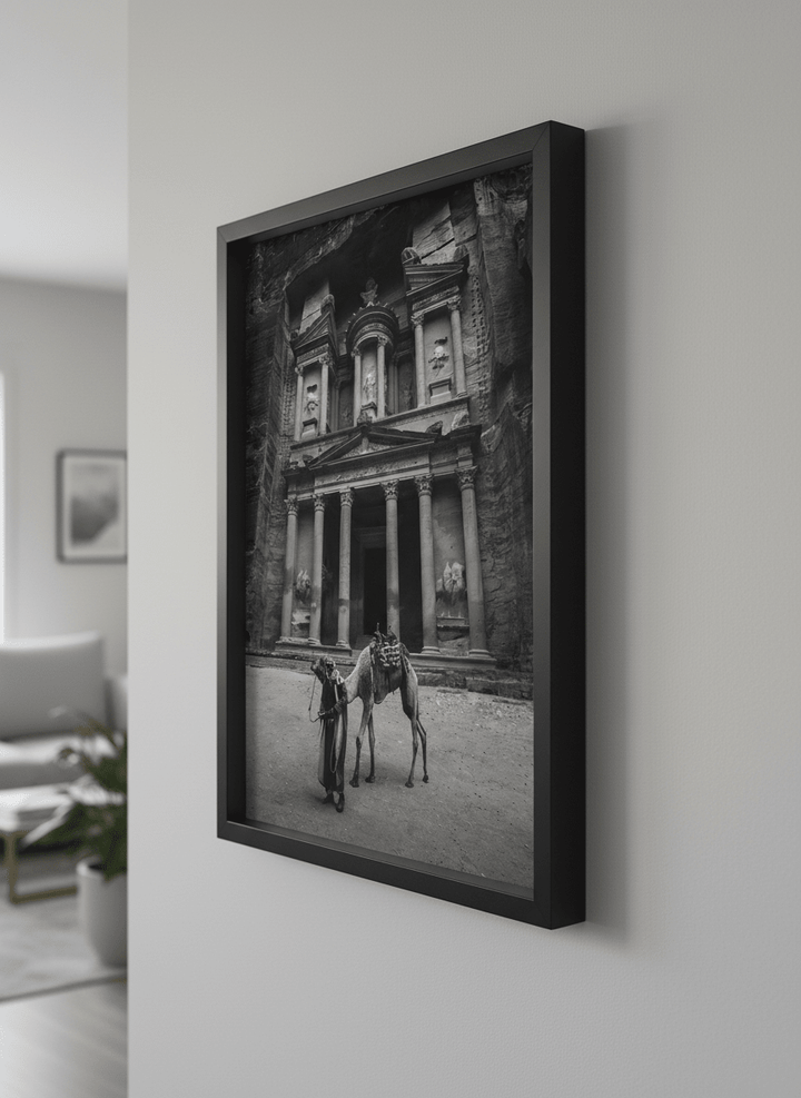 Modern wall art styled above a sofa in a neutral living room