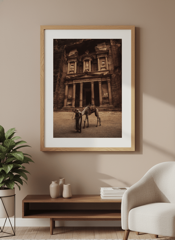 Modern wall art styled above a sofa in a neutral living room