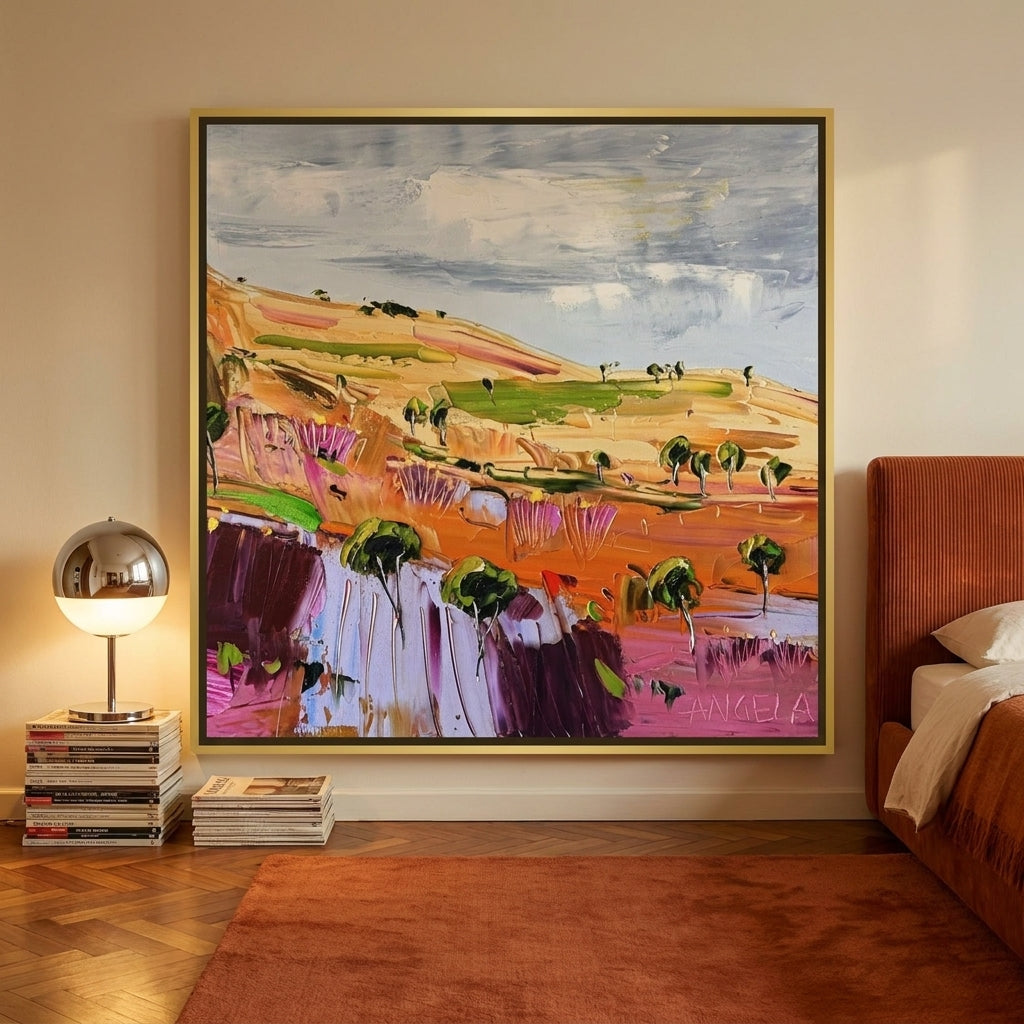 Canvas wall art with a gold leaf surround styled on the wall in a retro 70s bedroom