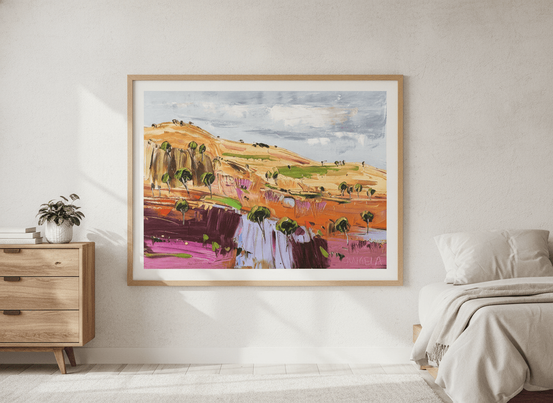 Minimalist artwork displayed in a calm, light-filled bedroom interior