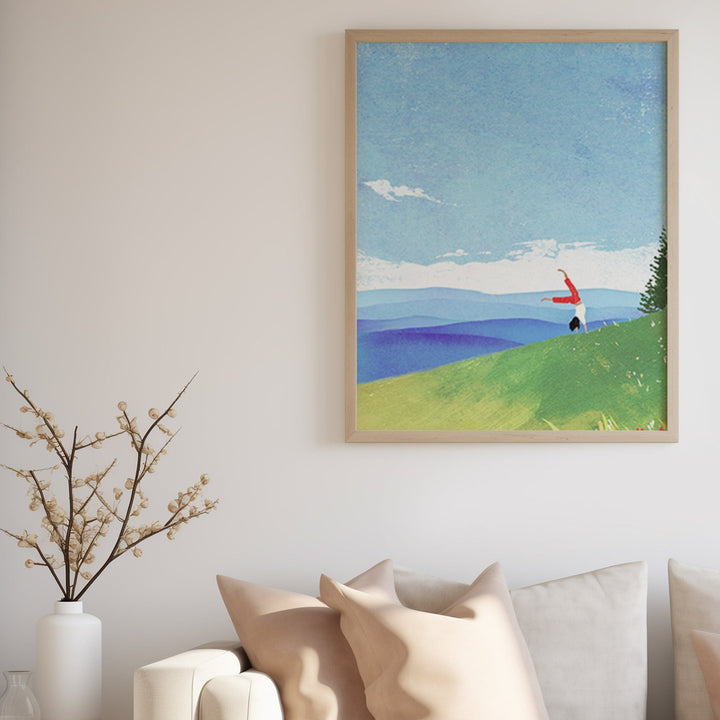 Living room with sofa, side table and artwork on wall