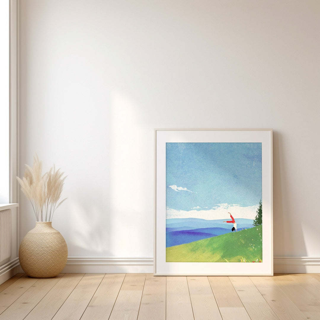 artwork placed on wooden floor leaning against wall