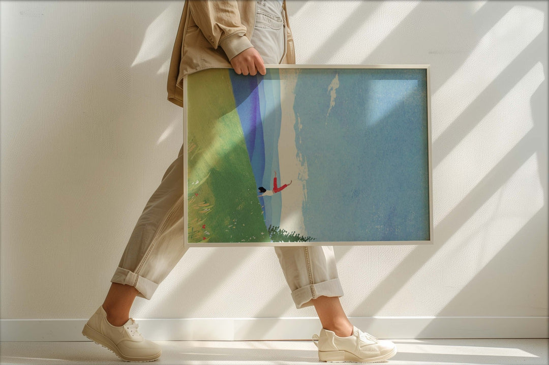 Person walking holding an artwork