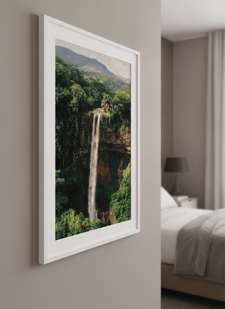 Minimalist artwork displayed in a calm, light-filled bedroom interior