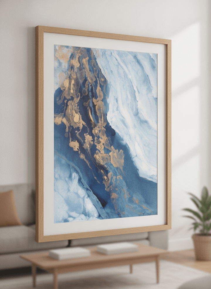Modern wall art styled above a sofa in a neutral living room