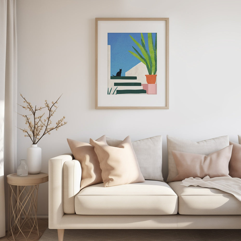 bright living room with cat artwork on the wall