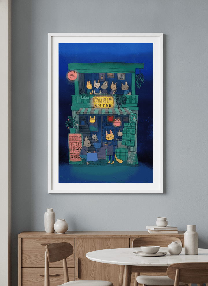 Wall art styled above a dining table in a contemporary home