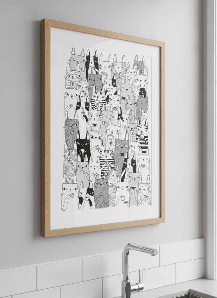 Artwork styled on the wall of a bright modern kitchen