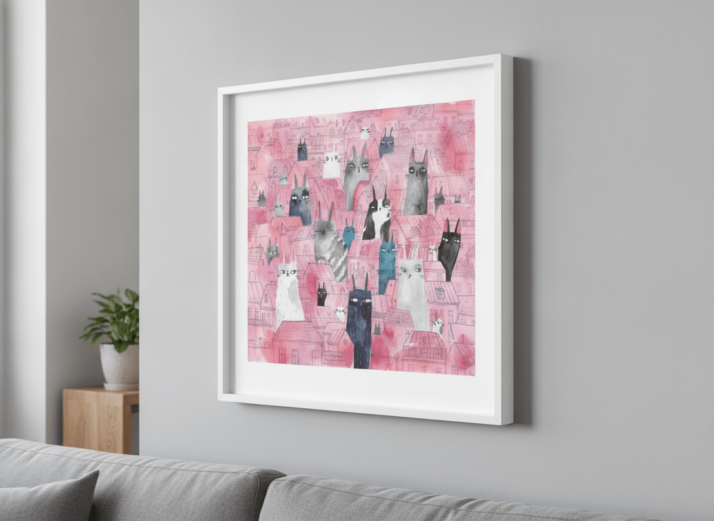 Modern wall art styled above a sofa in a neutral living room