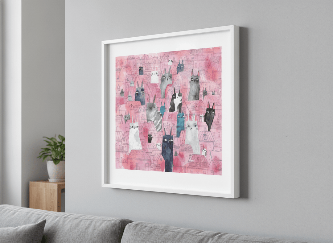 Modern wall art styled above a sofa in a neutral living room