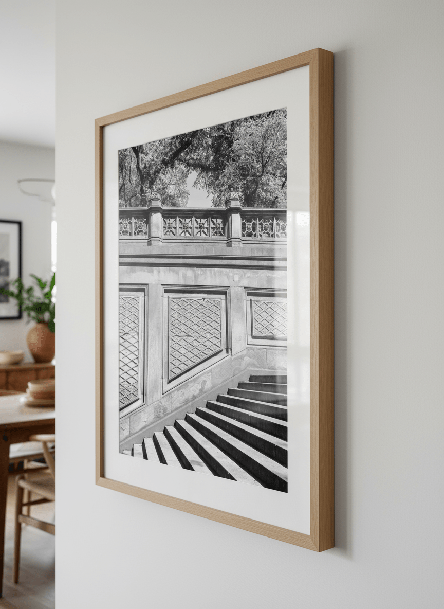 Wall art styled above a dining table in a contemporary home