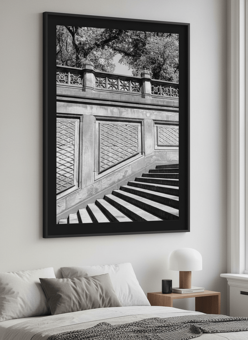 Minimalist artwork displayed in a calm, light-filled bedroom interior
