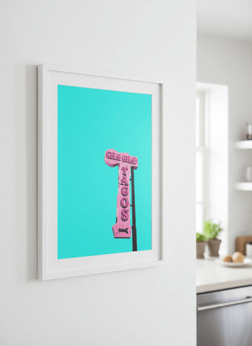 Artwork styled on the wall of a bright modern kitchen