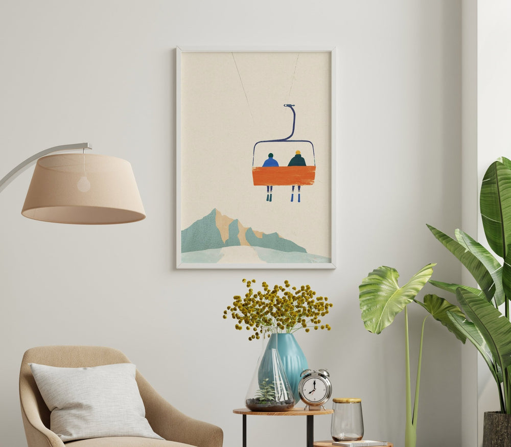 bright room with chair and side table and an artwork hanging on wall