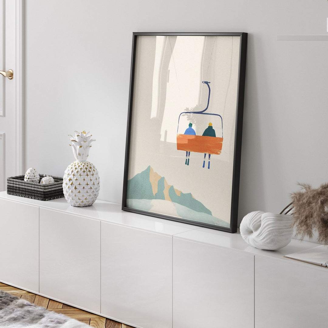 White cabinet with pineapple figure, nautilus shell and artwork in the middle