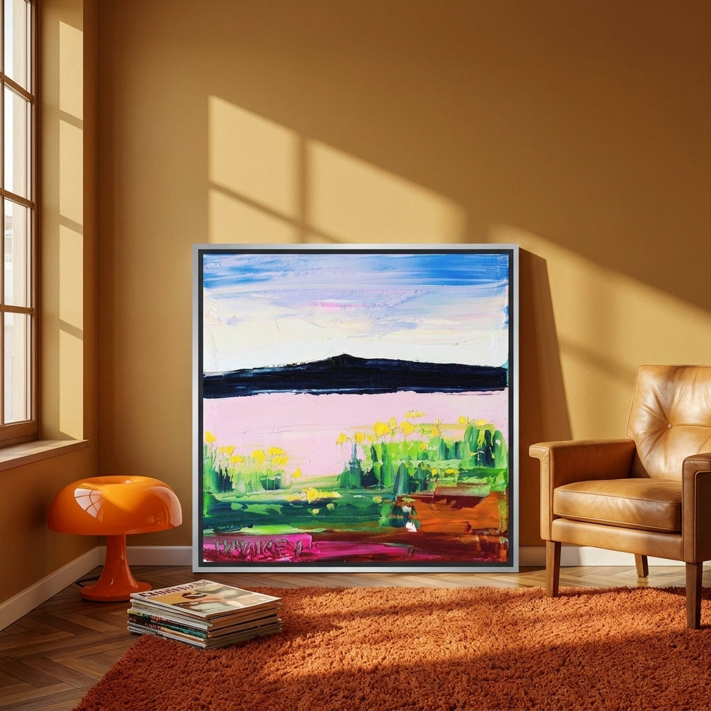 Canvas wall art with a silver leaf surround leaning against the wall in a retro 70s dining room