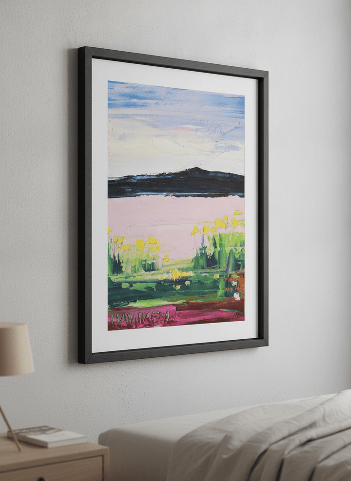 Minimalist artwork displayed in a calm, light-filled bedroom interior