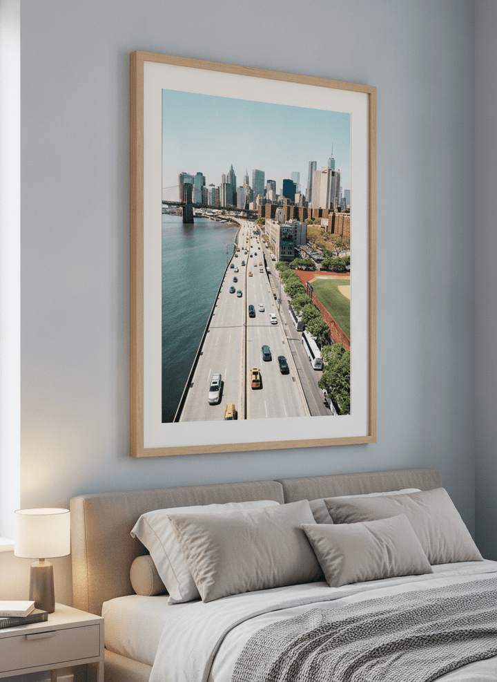 Minimalist artwork displayed in a calm, light-filled bedroom interior