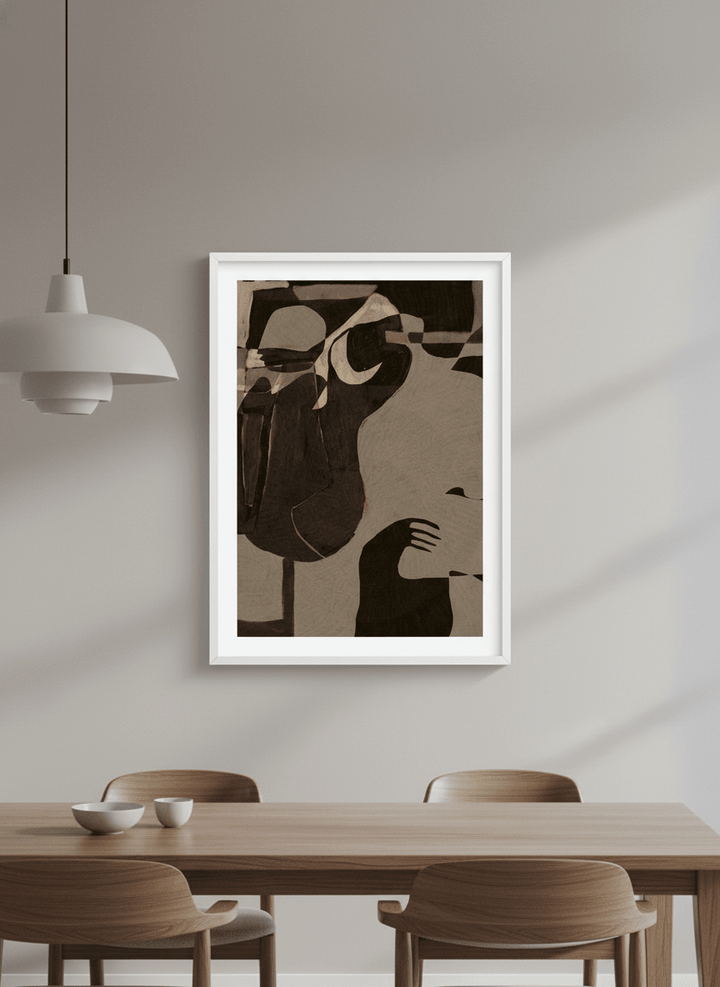 Wall art styled above a dining table in a contemporary home