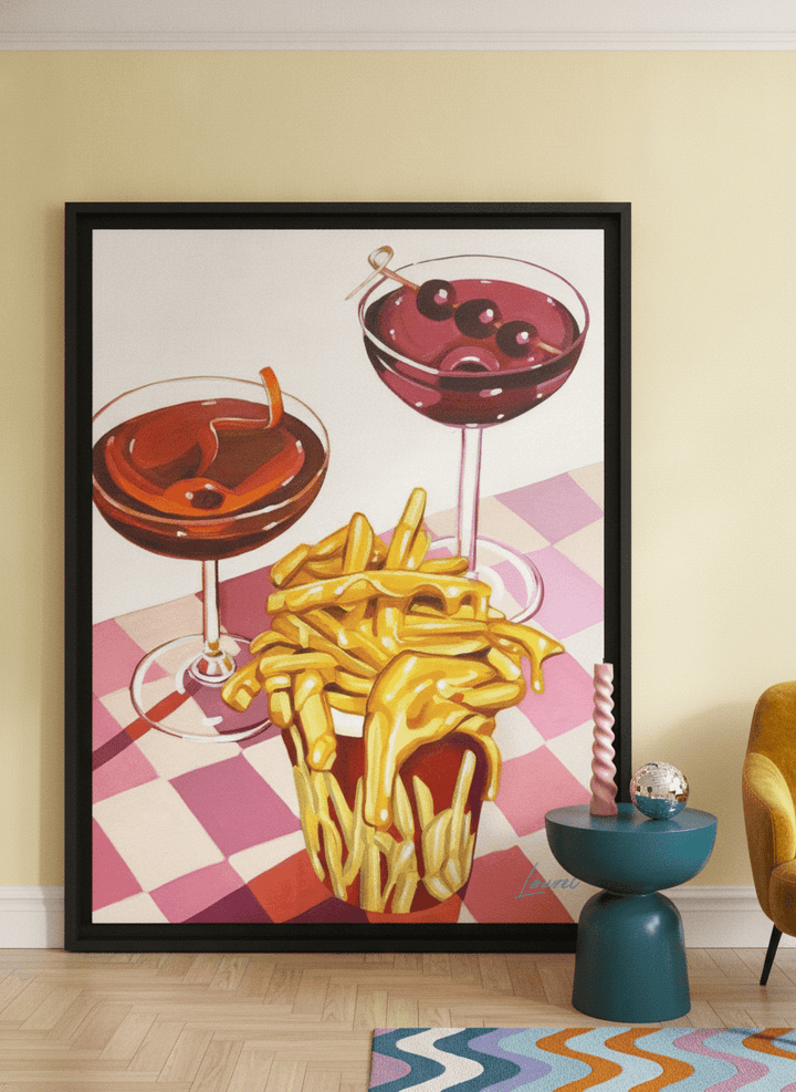 Oversized statement modern wall art print leaning against the wall in a colourful eclectic dining room