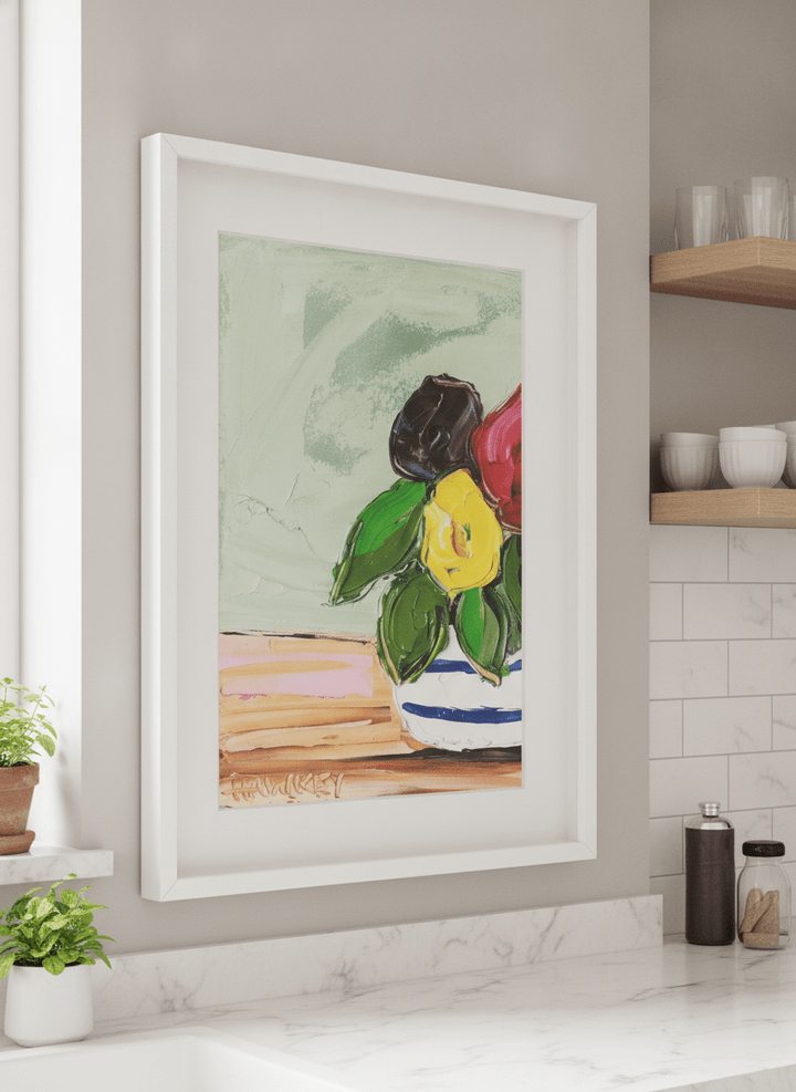 Artwork styled on the wall of a bright modern kitchen