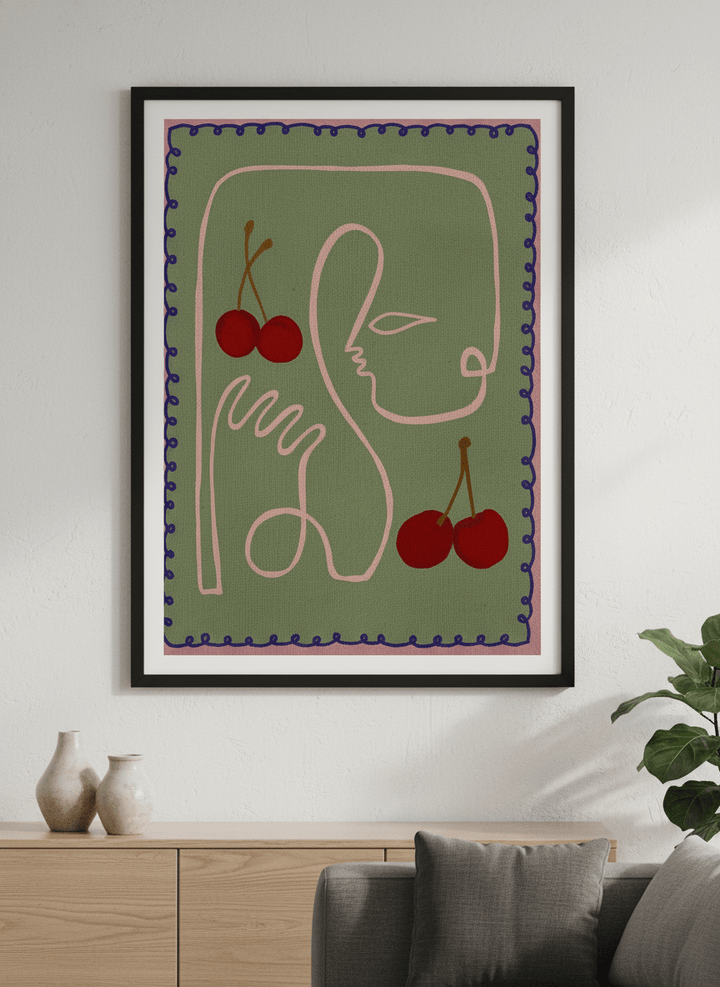 Modern wall art styled above a sofa in a neutral living room