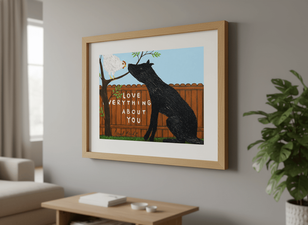 Modern wall art styled above a sofa in a neutral living room