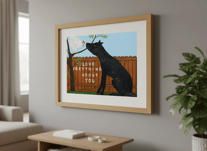 Modern wall art styled above a sofa in a neutral living room