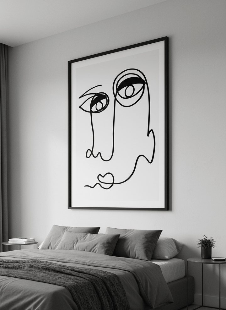 Minimalist artwork displayed in a calm, light-filled bedroom interior