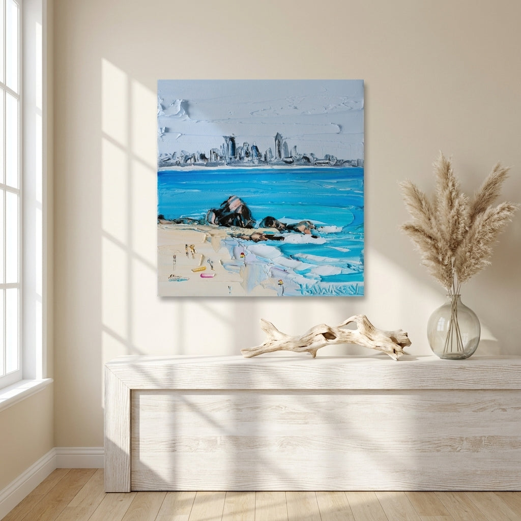 Stretched canvas wall art styled on the wall in a coastal living room