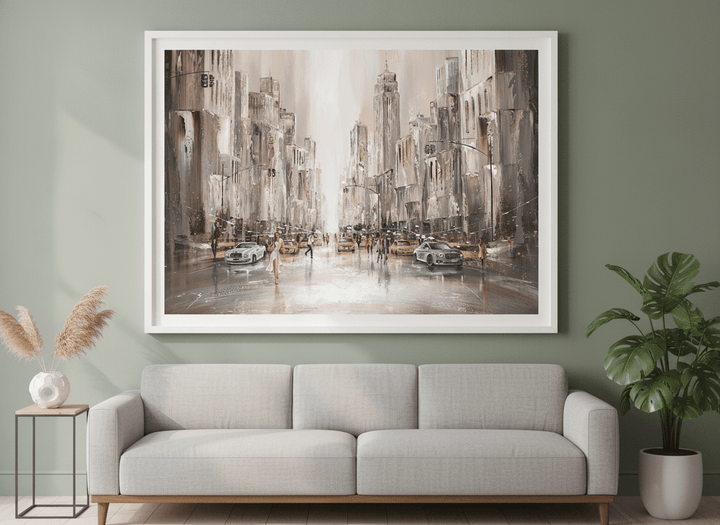 Modern wall art styled above a sofa in a neutral living room