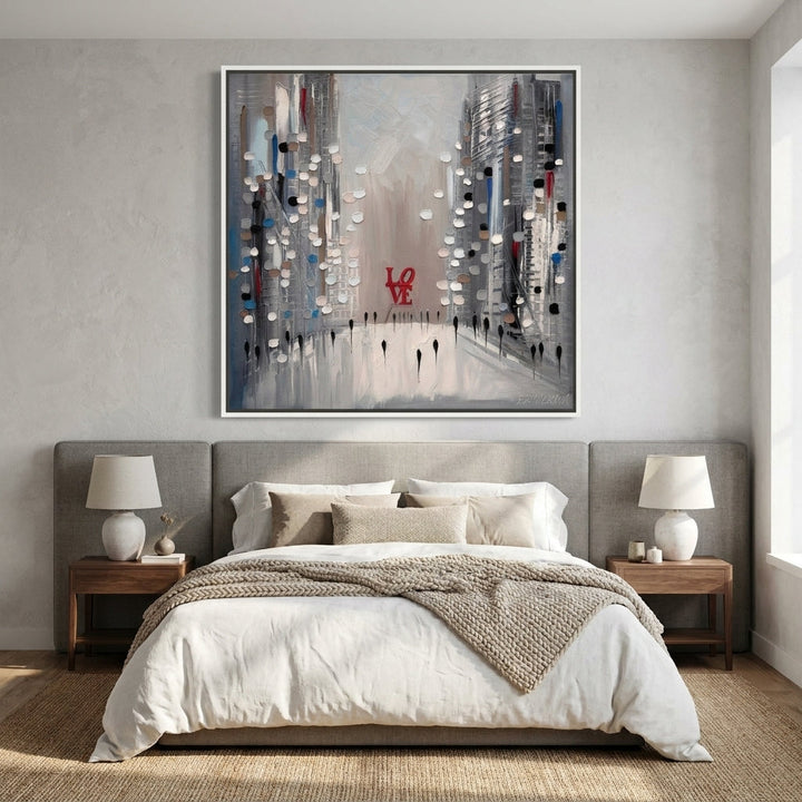 Canvas wall art with a white surround styled in a calm, light-filled bedroom