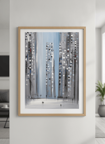 Modern wall art styled above a sofa in a neutral living room