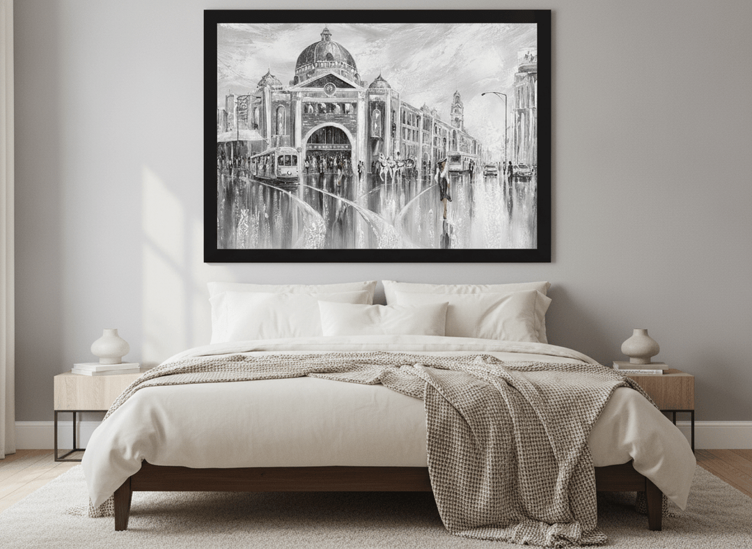 Minimalist artwork displayed in a calm, light-filled bedroom interior