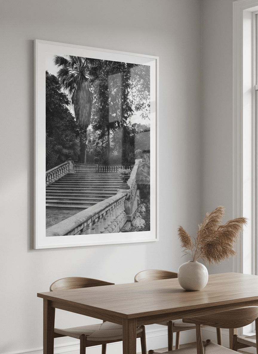 Wall art styled above a dining table in a contemporary home
