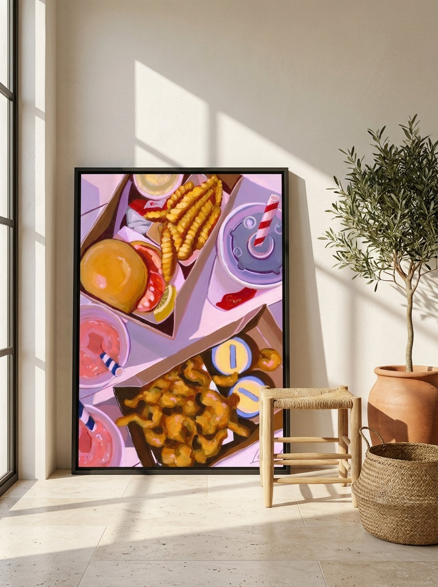 Canvas wall art with a black surround leaning against the wall in a Mediterranean kitchen