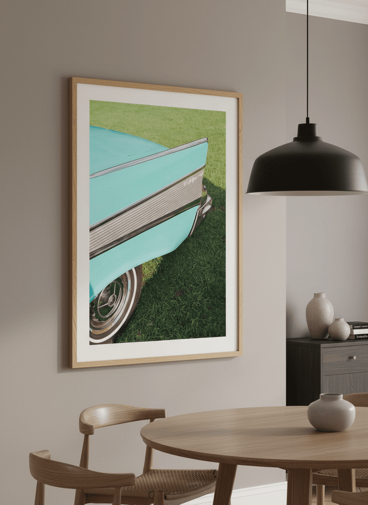 Wall art styled above a dining table in a contemporary home