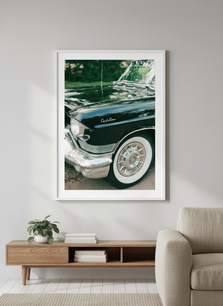 Modern wall art styled above a sofa in a neutral living room