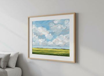 Minimalist artwork displayed in a calm, light-filled bedroom interior