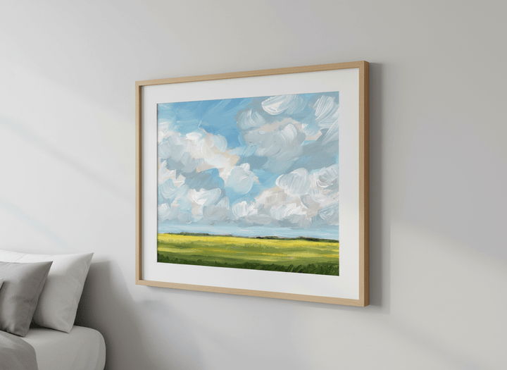 Minimalist artwork displayed in a calm, light-filled bedroom interior